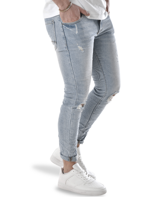 Jeans slim con strappi sul ginocchio YX5141