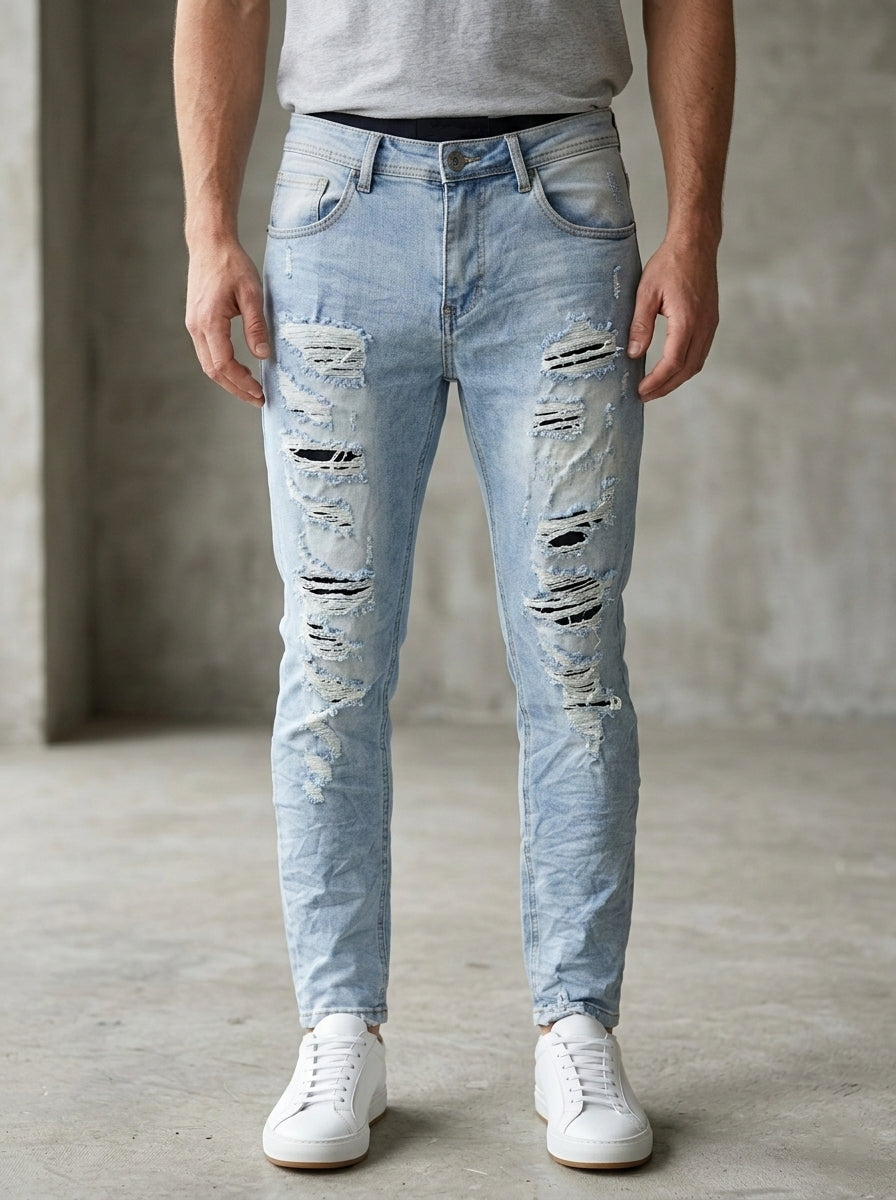Jeans slim fit con rotture art yx714 denim chiaro
